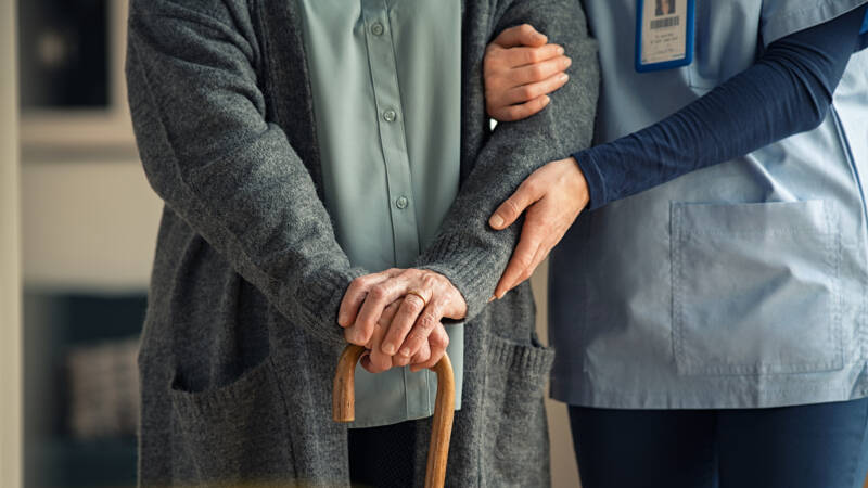Older person being supported by staff